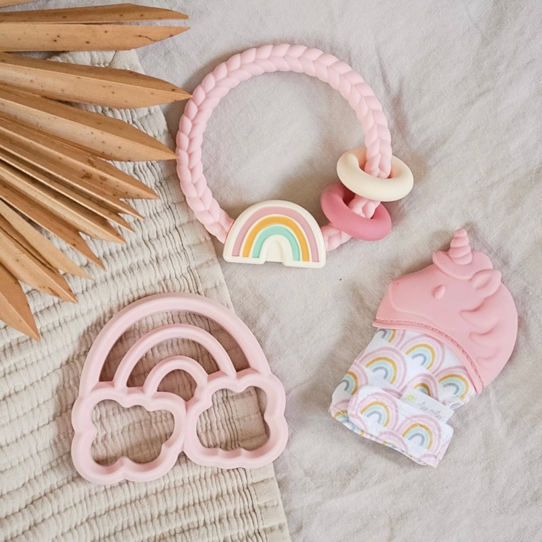 Itzy Mitt™ Silicone Teething Mitts: Highland Cow - Premium teethers from Itzy Ritzy - Just $9.95! Shop now at Pat's Monograms