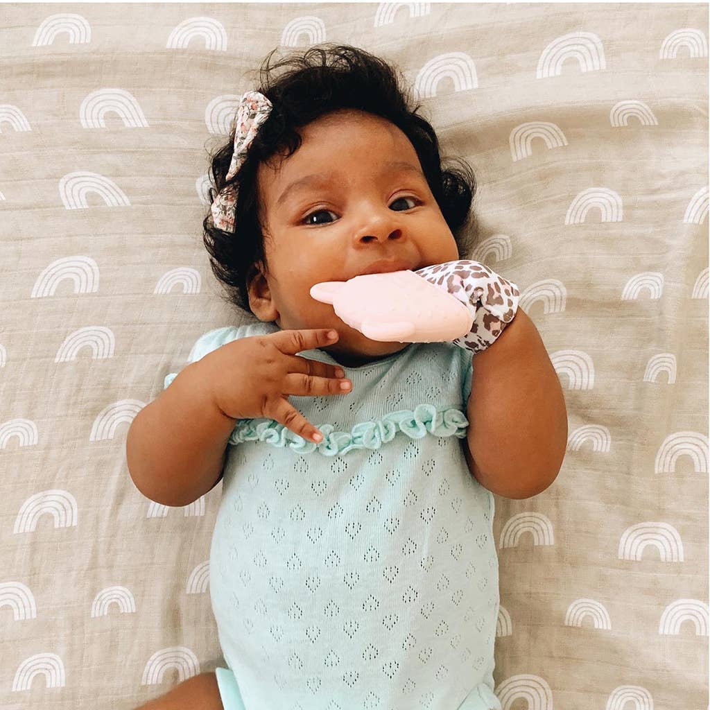 Itzy Mitt™ Silicone Teething Mitts: Highland Cow - Premium teethers from Itzy Ritzy - Just $9.95! Shop now at Pat's Monograms