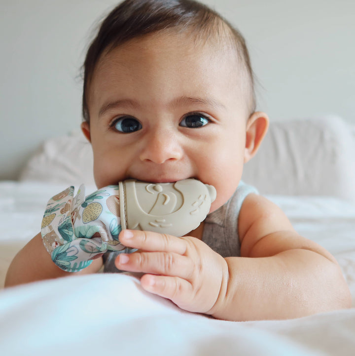 Itzy Mitt™ Silicone Teething Mitts: Highland Cow - Premium teethers from Itzy Ritzy - Just $9.95! Shop now at Pat's Monograms