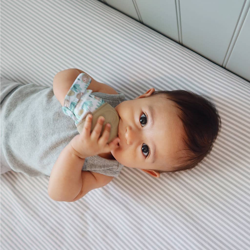 Itzy Mitt™ Silicone Teething Mitts: Highland Cow - Premium teethers from Itzy Ritzy - Just $9.95! Shop now at Pat's Monograms
